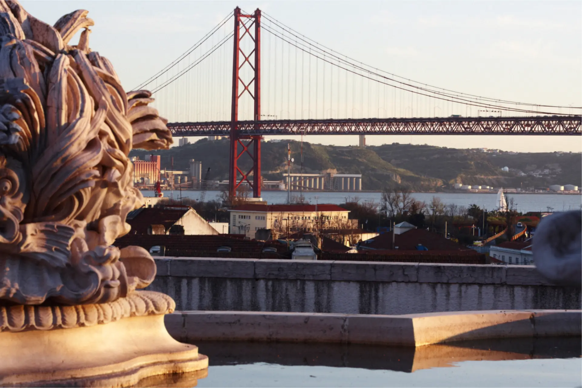 The 25 de Abril bridge over the Tagus seen from a Lisbon terrace